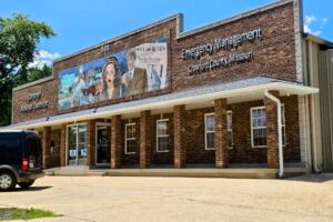 "News and Review" newspaper mural headline "Bette Davis Visits Cuba" "News and Review" newspaper mural headline "Bette Davis Visits Cuba"