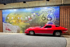 The mural is made of tiles and half of a 63 Corvette split window The mural is made of tiles and half of a 63 Corvette split window