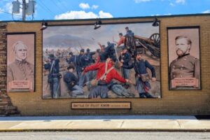 The Battle of Pilot Knob - Sept 27, 1864. Price's soldiers attached in 3 waves, the final desperate assault reaching the dry moat surrounding the fort. They were repelled by a combination of fierce fire and hand-thrown Ketcham grenades, leaving behind over 1000 dead and wounded. Union casualties numbered 12 dead, 65 wounded, and 129 missing. The Battle of Pilot Knob - Sept 27, 1864. Price's soldiers attached in 3 waves, the final desperate assault reaching the dry moat surrounding the fort. They were repelled by a combination of fierce fire and hand-thrown Ketcham grenades, leaving behind over 1000 dead and wounded. Union casualties numbered 12 dead, 65 wounded, and 129 missing.