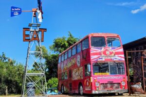 Can't miss the big pink double decker bus