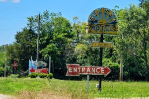 Sunset Motel Entrance and Exit signs