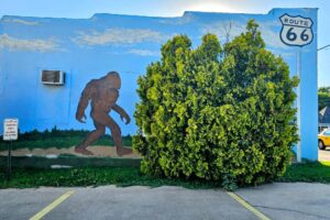 Bigfoot, walking behind real tree Bigfoot, walking behind real tree
