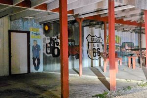 Murals under the awning of Luigi's Murals under the awning of Luigi's