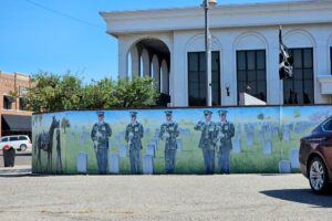 The playing of Taps and soldiers horse The playing of Taps and soldiers horse