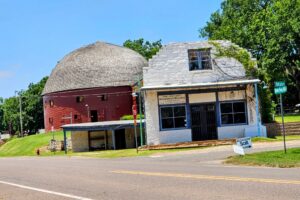 Edward Richardson Building in front of the Round Barn
