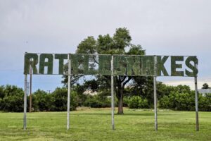 Rattlesnakes sign from an old roadside attraction Rattlesnakes sign from an old roadside attraction