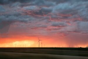 Sunset and storm in the distance Sunset and storm in the distance